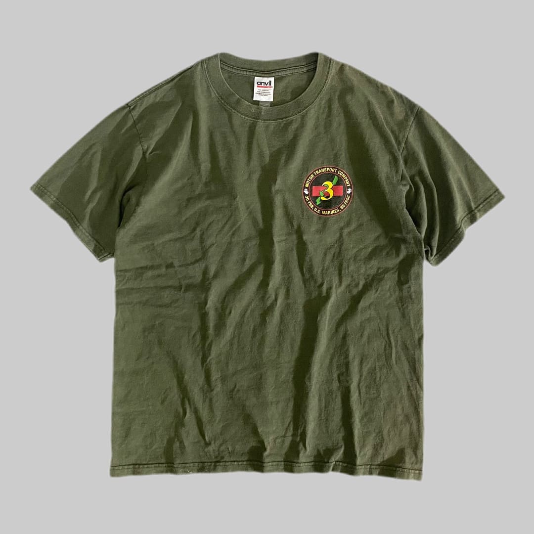 米軍放出品

【anvil】MOTOR TRANSPORT COMPANY S/S TEE

カラー：OD

サイズ：M
着丈：約65cm　身幅：約53cm　肩幅：約50cm　袖丈：約20cm

素材：コットン100％

anvilボディーのプリントTシャツ。

左胸にワンポイント、バックにプリントがございます。

※画像の程度とは若干異なる場合がございますので予めご了承下さい。
(キズ、へこみ、汚れ、穴あき、ほつれ、文字書入れ(名前、ナンバー)など
